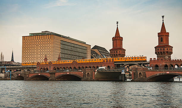 istock Yellow train on the Oberbaum bridge in Berlin 516414284