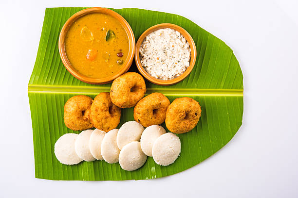istock idli vada sambar on coconut leaf, south indian food 516414368