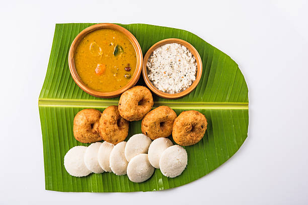 istock idli vada sambar on coconut leaf, south indian food 516414662
