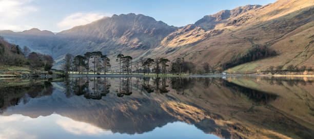 istock Panorama At Buttermere In The Lake District With Reflections. 516414814