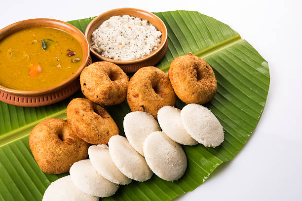 istock idli vada sambar on coconut leaf, south indian food 516415190