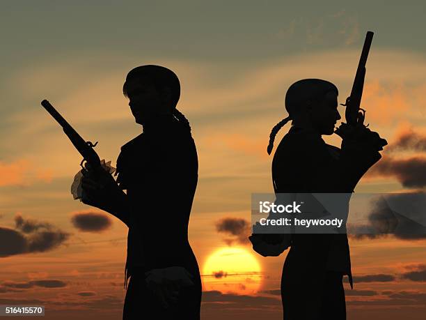 Duellists Silhouetted Against The Rising Sun Stock Photo - Download Image Now - Dueling, Handgun, Men