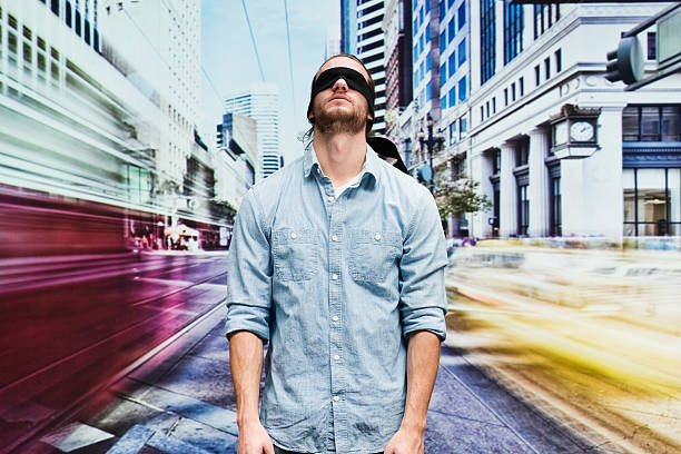 istock Blindfold man at street and searching 516416156