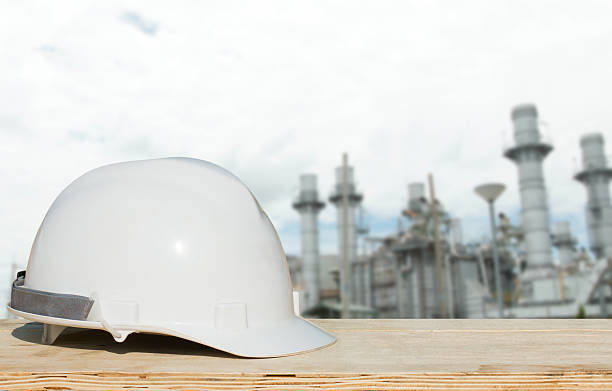 istock Safety helmet with over Construction site background. 516417220