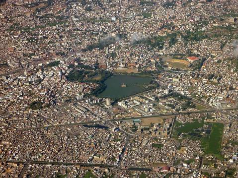 In the central highlands of Antananarivo, Madagascar, Lake Anosy is surrounded by choking a sprawl of homes, hotels, rice paddy fields, churches, apartments, sports stadiums and a crisscrossing maze of roads.
