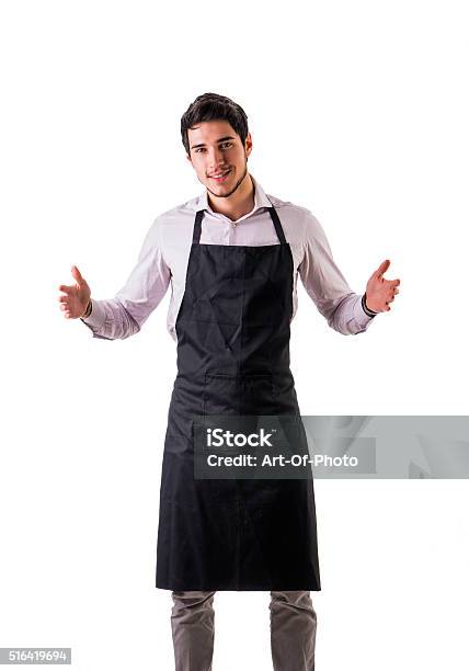 Young Chef Or Waiter Wearing Black Apron Isolated Stock Photo - Download Image Now - Chef, Cut Out, Men