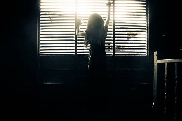 istock Ghost girl in haunted house 516419814