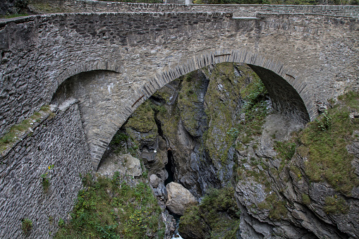 Old bridge on the Via Mala, which means bad way and a 8 km long section of path along the Hinterrhein river
