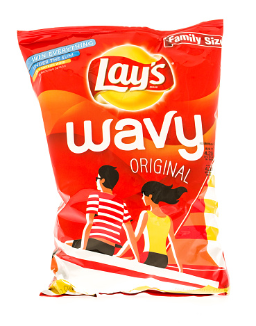  Winneconni, WI, USA - 2 July 2015: Bag of Lay's Wavy original potato chips.