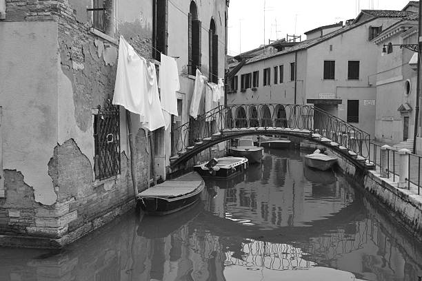 istock beautiful canal in Venice,  black and white 516424489