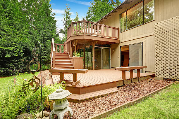 istock Wooden walkout deck with patio and benches 516424573