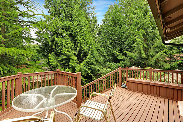 istock Wooden walkout deck with patio area 516424575