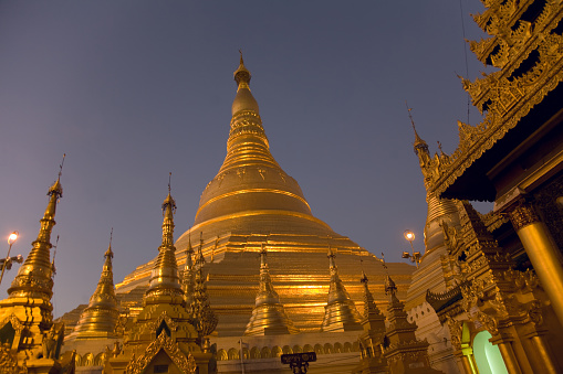 Shwedagon Paya is a 98m gilded stupa in Rangoon, Myanmar. Shwedagaon is the most religious Buddhist site in Myanmar housing several Buddha relics.