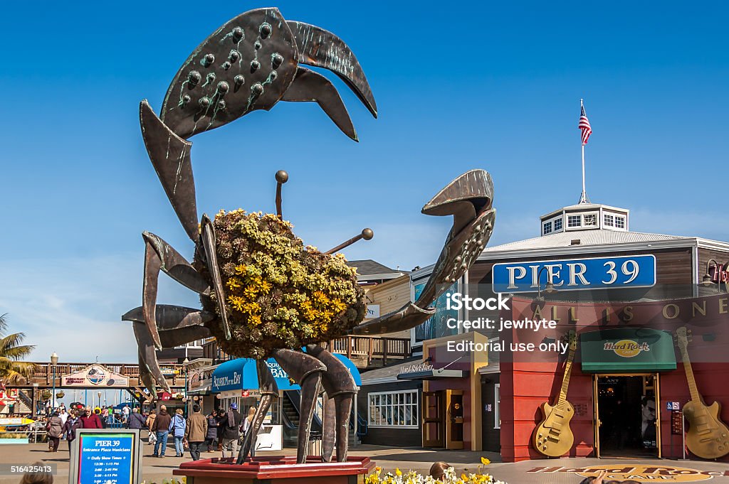 Pier 39 San Francisco, United States - February 25, 2008: Large crab sculpture at the entrance to famous Pier 39 on San Francisco's waterfront. Business Finance and Industry Stock Photo