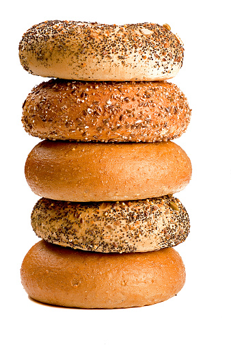 pile of bagel assortment isolated on white background