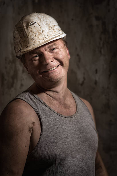 istock man in a helmet miner 516427992