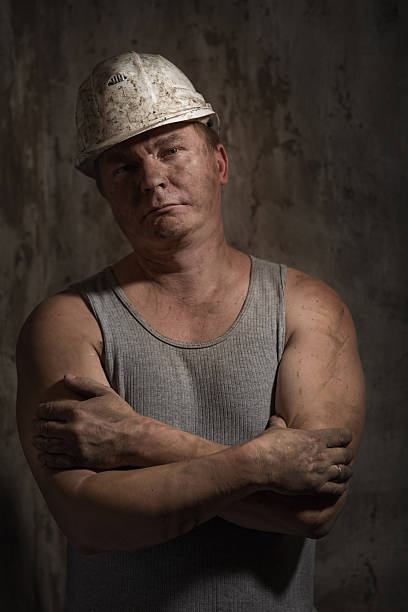 istock man in a helmet miner 516428472