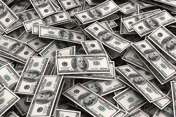 istock Stack of 100 dollars USA on white background. 516441115