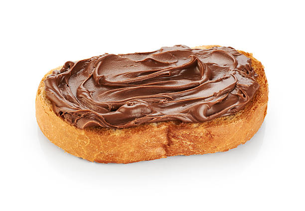 istock Toast with chocolate butter isolated on white background. 516443508