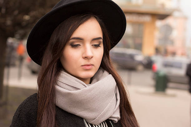 istock Young brunette woman in hat 516443970
