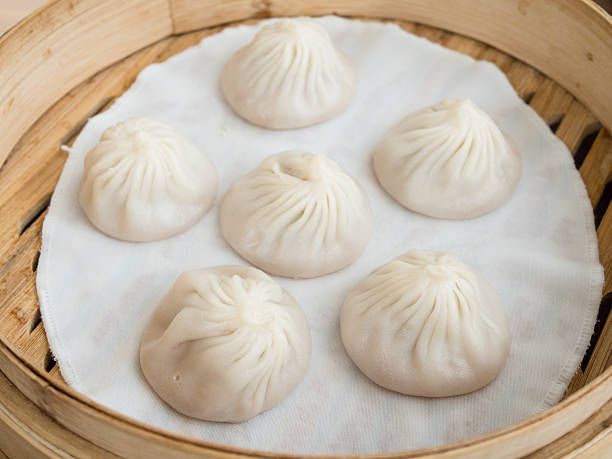 istock Xiao Long Bao - Shanghai style steamed pork dumplings 516444632