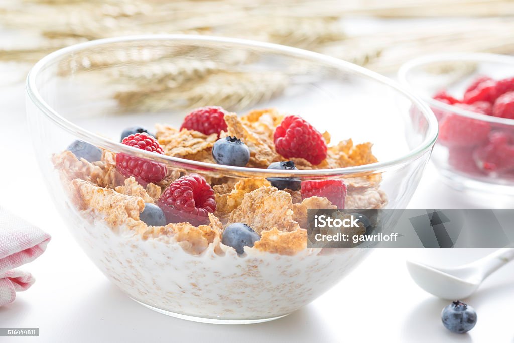 Cereal flakes with fresh raspberry closeup Berry Fruit Stock Photo