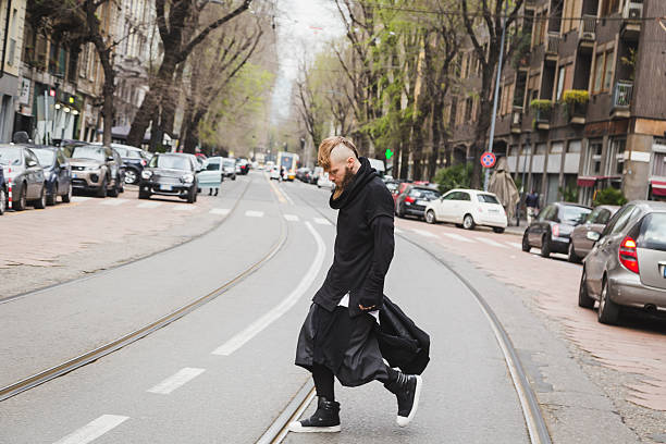 istock Stylish bearded man posing in the street 516446136