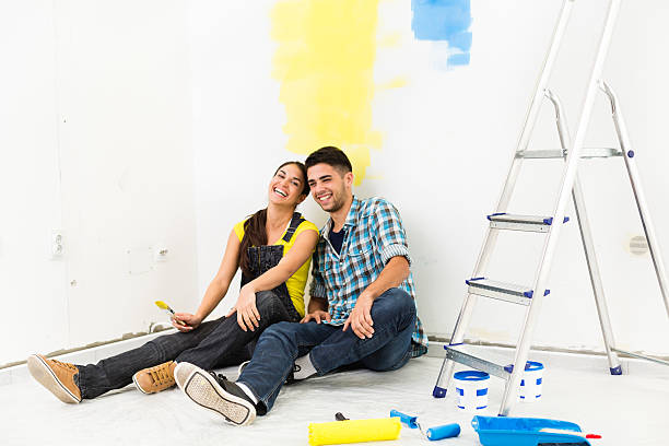 istock Young couple redecorating their new home 516449674
