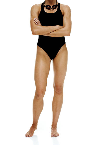 istock Swimmer standing with arms crossed 516450402