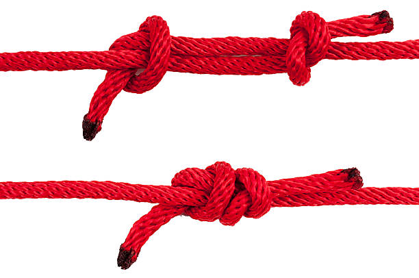 istock Red Rope in A Knot Isolated on White Background. 516452084