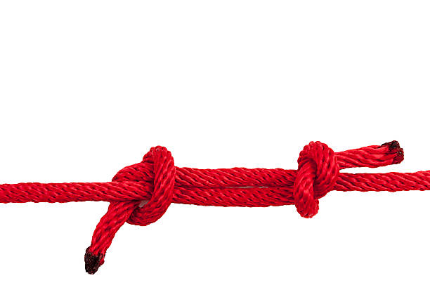 istock Red Rope in A Knot Isolated on White Background. 516452200