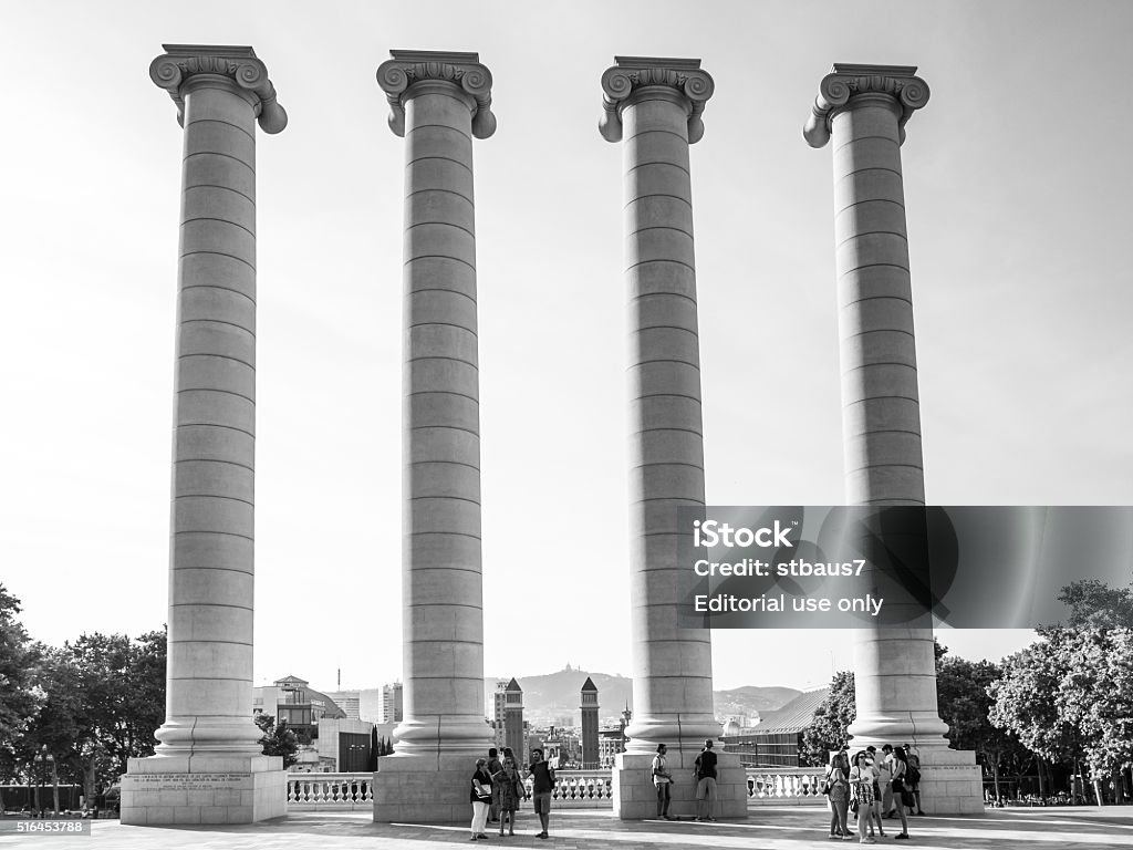 Barcelona Columns Barcelona, Spain - July 14, 2015: Summer day view of the columns representing the 4 bars of the catalan flag in Montjuich mountain, Barcelona. Architectural Column Stock Photo
