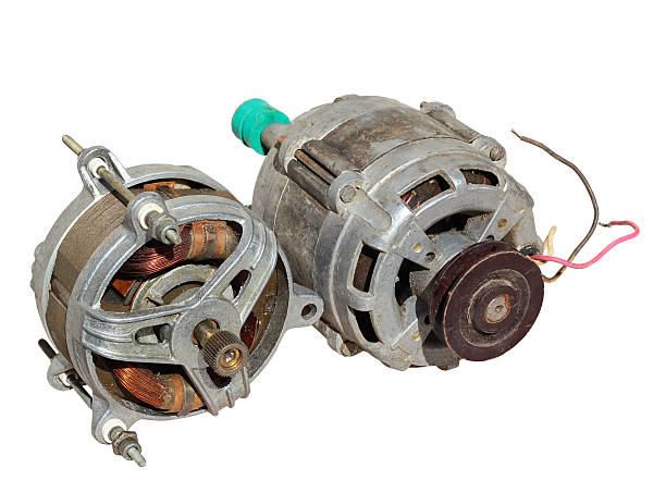 istock Two old electric motors isolated on white background 516455022