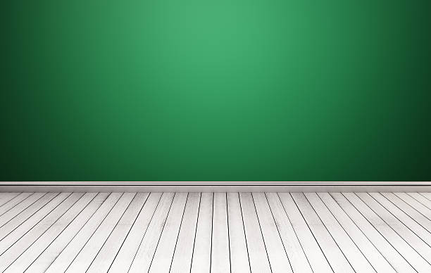 istock White wood floor with green wall 516455240