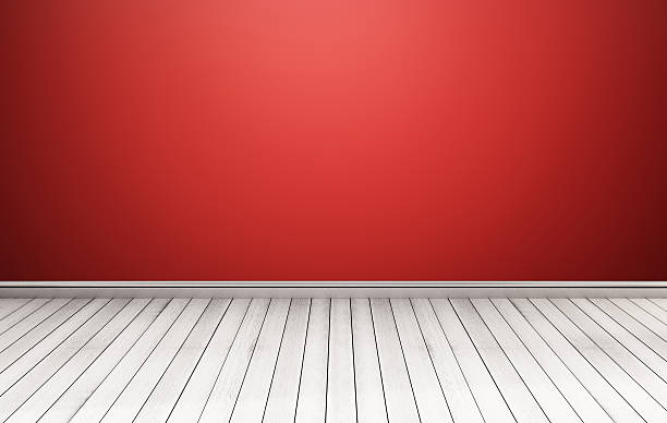 istock White wood floor with red wall 516455424