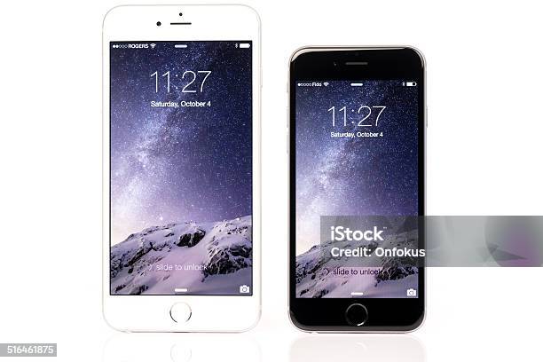 Iphone 6 And Iphone 6 Plus Comparison On White Background Stock Photo - Download Image Now