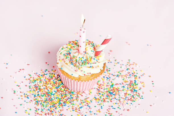 Cupcake with sprinkles stock photo