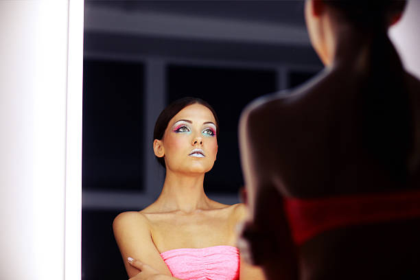 istock Beautiful girl with colorful makeup 516464849