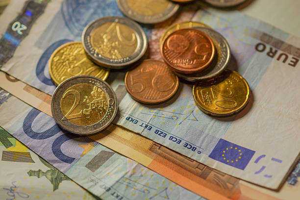 istock Euro coins and banknotes money. 516466117