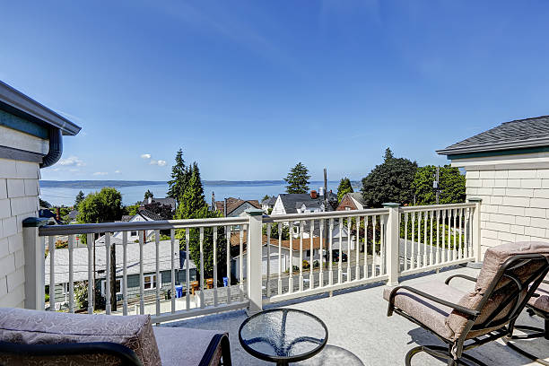 istock Cozy walkout deck overlooking scenic bay view 516466413