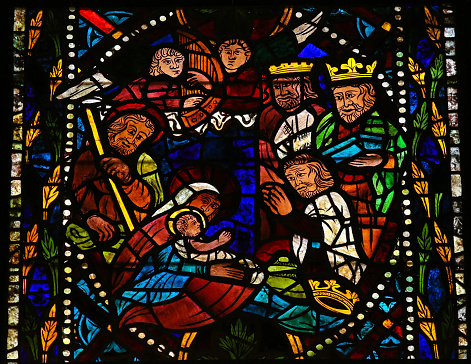 Stained glass window depicting a Nativity Scene with the Three Magi from the East in the cathedral of Leon, Castille and Leon, Spain. This window is more than 400 years old, no property release is required.