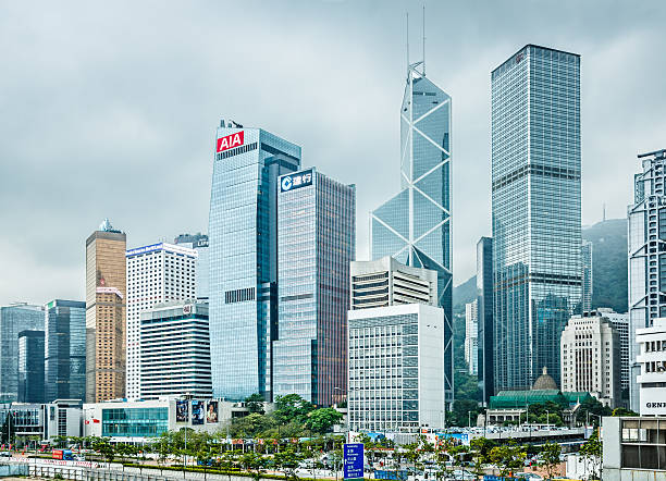 Hong Kong financial district, Victoria Harbour, Hong Kong Island Hong Kong financial district, Victoria Harbour, the north part of Hong Kong Island, China. hong kong business district stock pictures, royalty-free photos & images