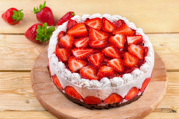 istock Yogurt cake with strawberries on wood table 516486447