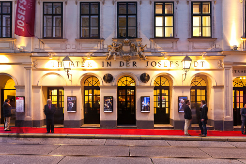 Vienna, Austria - September 17, 2014: Some waiting for the next plays in front of the Theater in der Josefstadt.