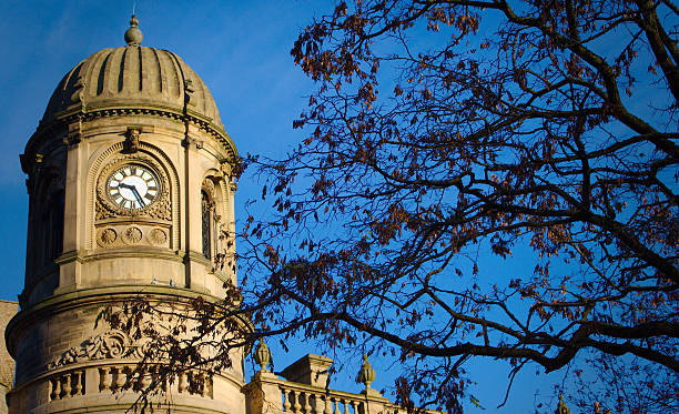 istock topsection of sowerby bridge town hall against blue sky 516488943
