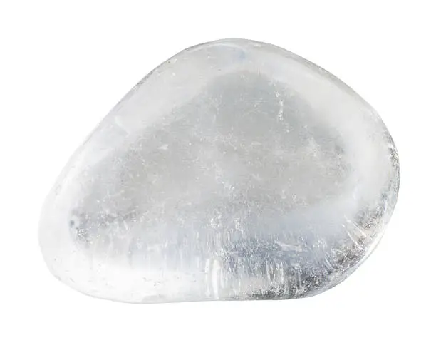 macro shooting of natural gemstone - tumbled quartz rock crystal mineral gem stone isolated on white background