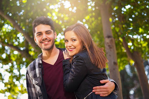 istock Couple hugging in the park. selective focus 516498180