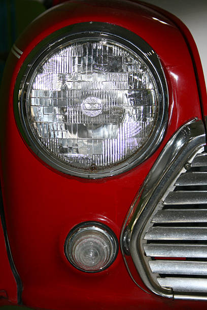 istock vintage headlight of retro red car 516498584