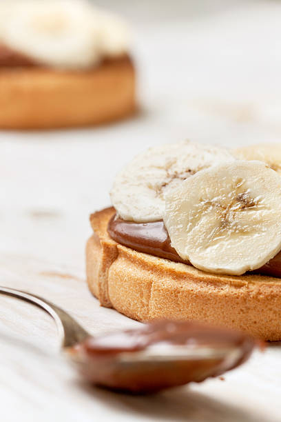 istock toast with banana and chocolate cream 516500140