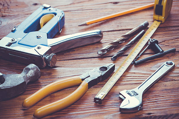 istock old set of hand tools on a wooden panel 516500802